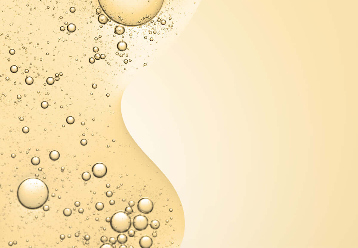 Light beige powder texture, representing kojic acid’s natural skin brightening power
