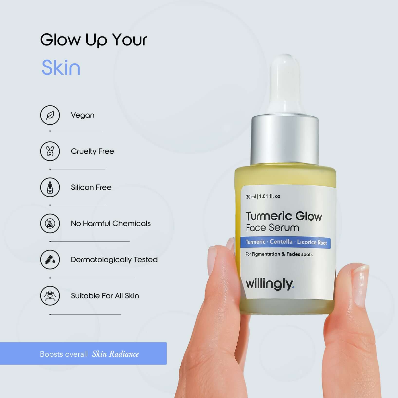 Hand holding Willingly Turmeric Glow Face Serum bottle with vegan and cruelty-free benefits listed