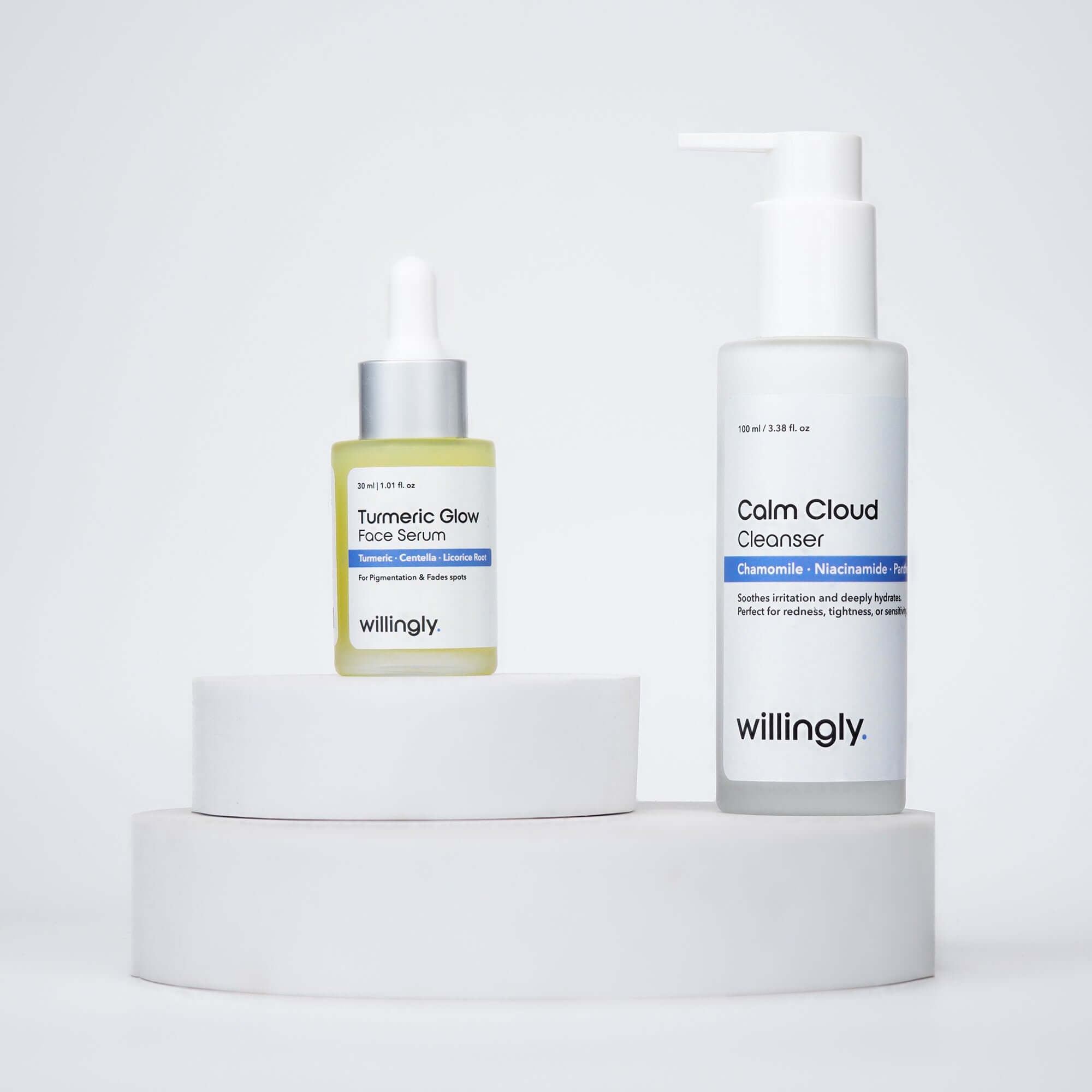 Willingly Soothe & Glow Kit with Calm Cloud Cleanser and Turmeric Glow Serum on white marble display