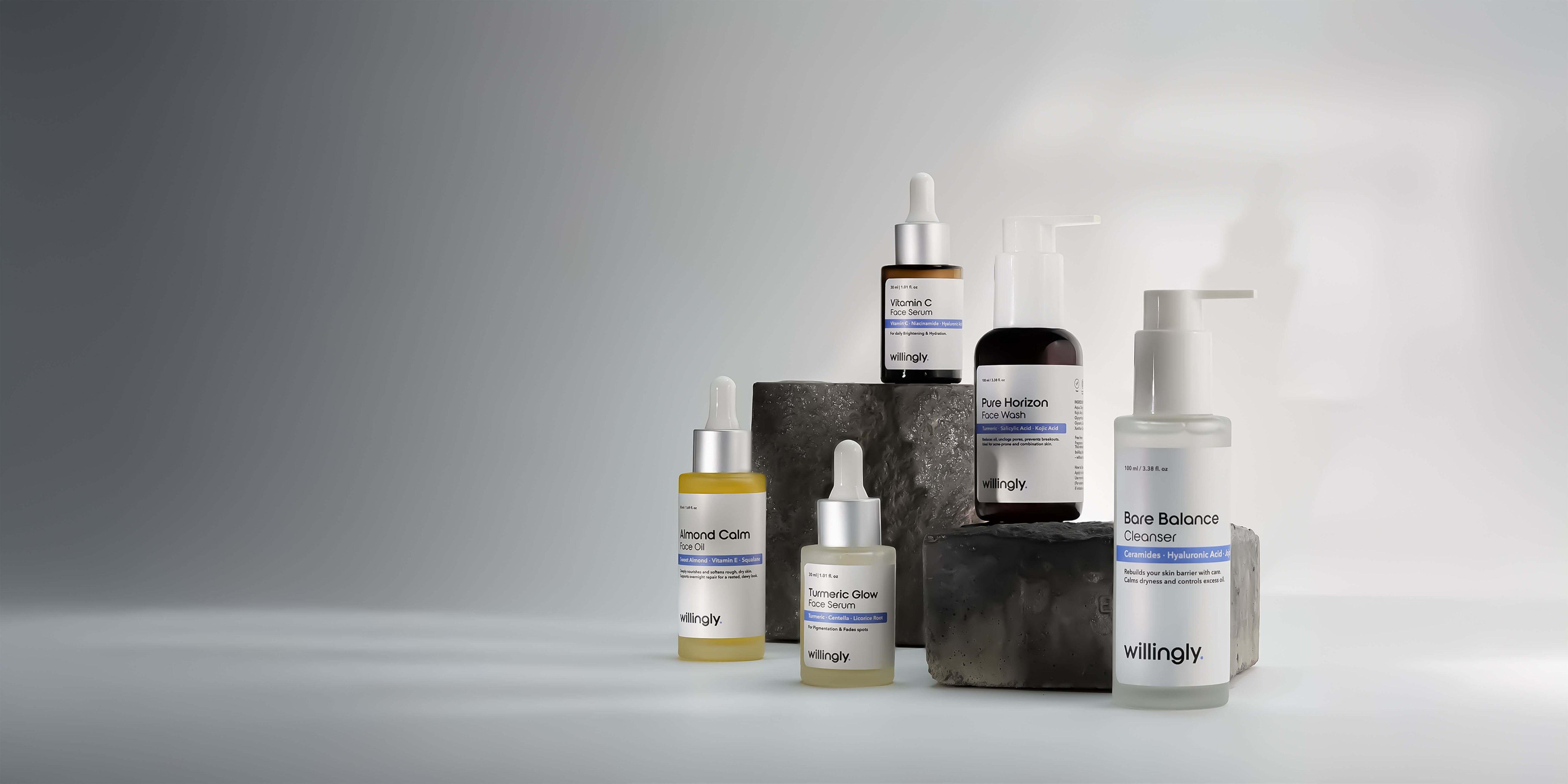 Collection of skincare products on a gray background